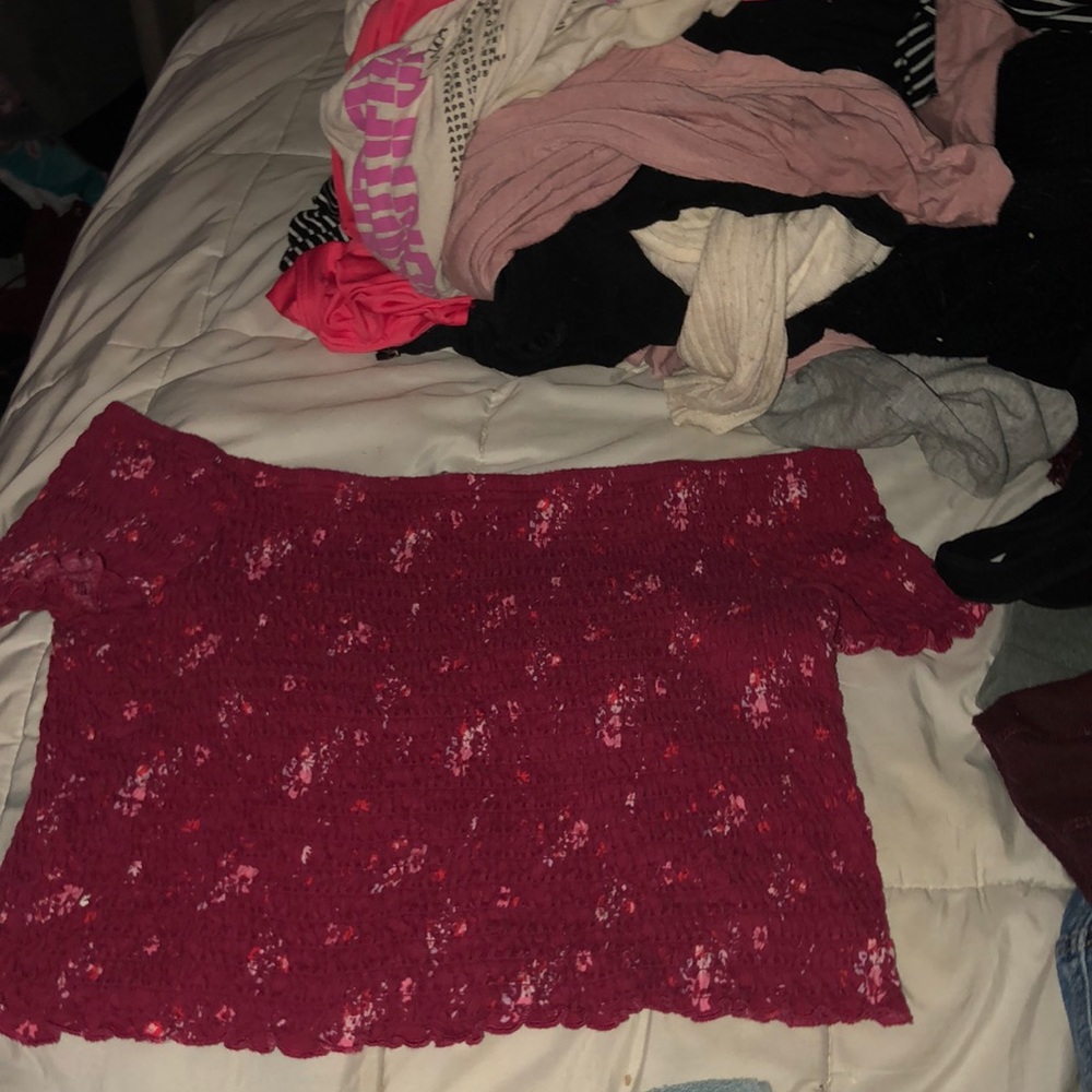 Reddish pinkish off the shoulder cropped top